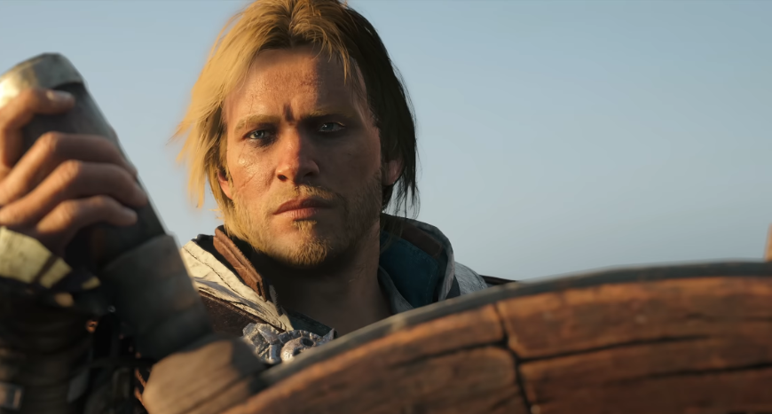 Edward Kenway drží kormidlo, screenshot z traileru na Assassin's Creed Black Flag Resynced