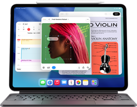 iPad Air zobrazujúci plochu s viacerými apkami Apple, spárovaný s klávesnicou Magic Keyboard a ceruzkou Apple Pencil Pro