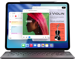 iPad Air zobrazujúci plochu s viacerými apkami Apple, spárovaný s klávesnicou Magic Keyboard a ceruzkou Apple Pencil Pro